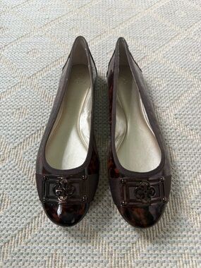 Isola Brown Tortoiseshell Ballet Flats with Decorative Medallion